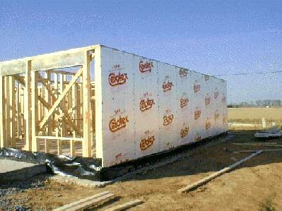 Walls begin to cover structural beams. 1/15/99