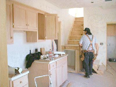 Kitchen interior with new cabinets installed. 1/4/99