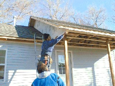 Working on the porch roof. 1/4/99